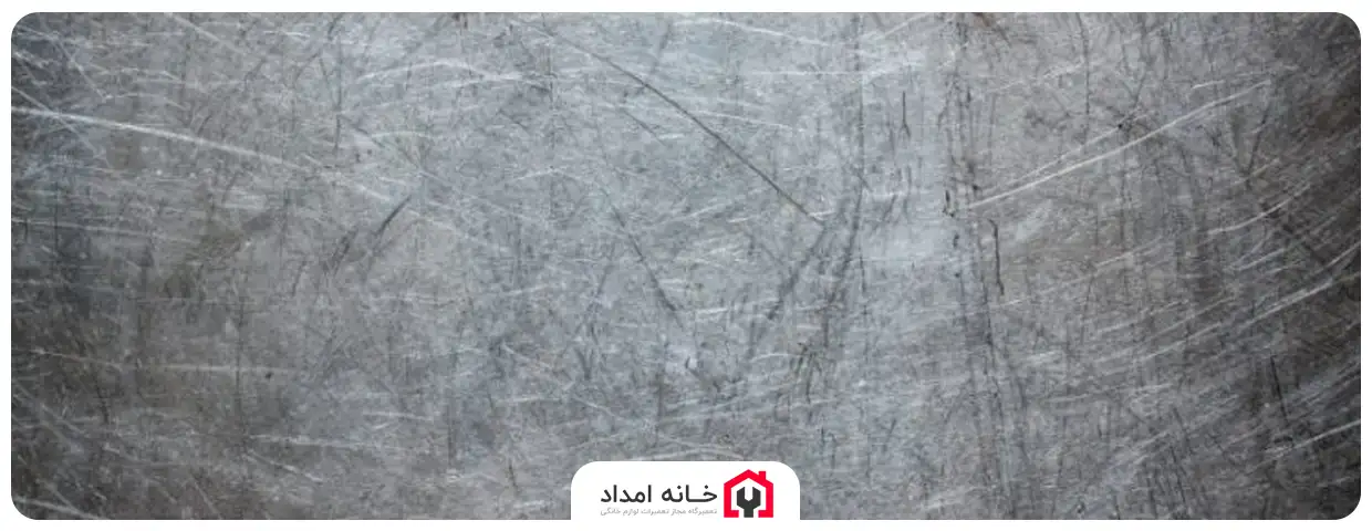 چگونه خط و خش بر روی درب یخچال ایجاد می‌ شود؟